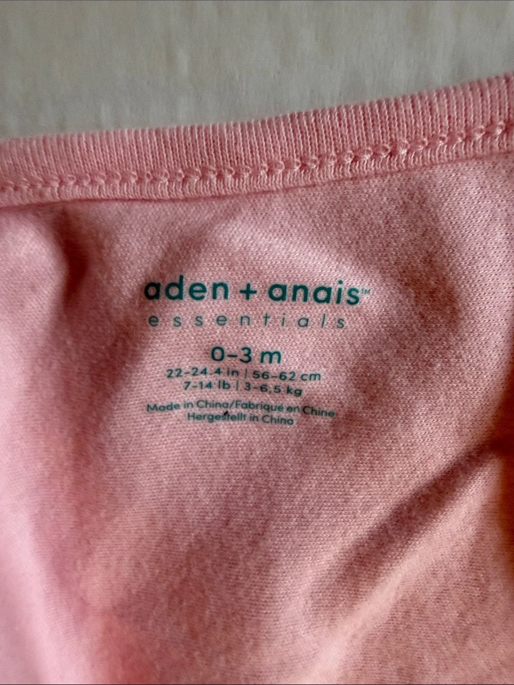 Aden & Anais Sleep sack, Burt’s Bees Footed sleeper, Carter’s onesie